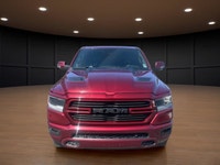 Introducing the stunning red 2023 Ram 1500 Sport 4x4 Crew Cab 5'7" Box, designed to handle the road... (image 2)