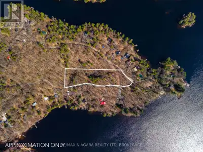 Cottage country paradise awaits. Welcome to your opportunity to own a private 2+ acre wooded lot wit...