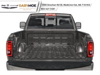 The 2026 Ram 3500 Tradesman Trim 4x4 Crew Cab 8 Box is a commanding presence with its bold Black ext... (image 7)