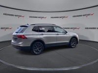 This Volkswagen Tiguan has a dependable Turbo Gas 4cyl 2.0 L engine powering this Automatic transmis... (image 7)