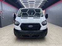 The 2024 Ford Transit Cargo Van T-250 130 Low Rf 9070 GVWR AWD in pristine white is a formidable veh... (image 7)
