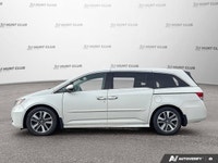 Simplify family journeys with the 2016 Honda Odyssey Touring. This white minivan, with 157,038 kilom... (image 2)