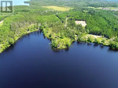 This prime lakeside property offers an exceptional opportunity for both personal retreat and develop...