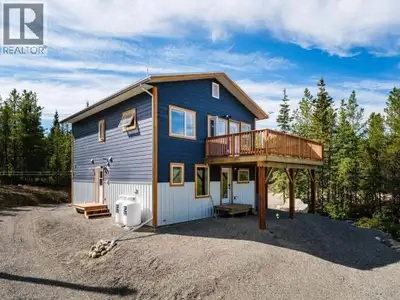 Escape to beautiful Ibex Valley with this unique and versatile property set on over 9 acres, approxi...