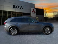 The 2025 Mazda CX-90 MHEV GS-L in a sophisticated gray finish beckons those seeking a premium drivin... (image 3)