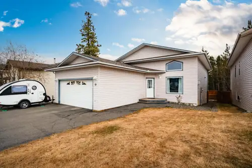 Welcome to 13 Black Bear Lane in Copper Ridge! A stunning 4-bedroom (plus den), 3-bathroom home that...