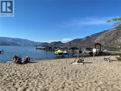CHARMING TOP FLOOR UNIT WITH BEAUTIFUL LAKEVIEW in Casa Del Lago, one of the most desirable WATERFRO...