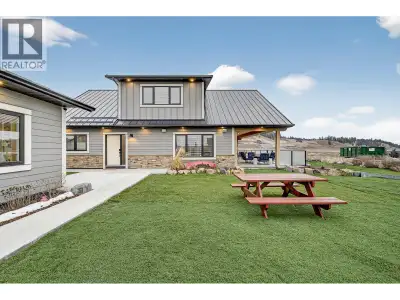 Looking for a 5-bed home in Koocanusa Village with lake views, luxury systems, and seamless indoor-o...