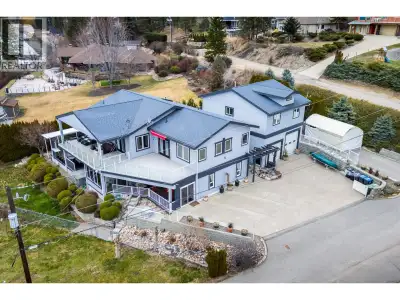 Discover the ULTIMATE LAKESIDE RETREAT in this meticulously reimagined SEMI-WATERFRONT HOME. Only st...