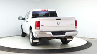 The Ram 1500 Classic SLT, presented in a striking white, is a robust and reliable 4x4 truck, ideal f... (image 3)