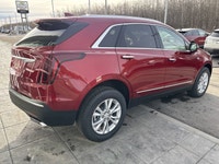 AMVIC LICENSED DEALER The 2026 Cadillac XT5 Luxury AWD, finished in Radiant Red Tintcoat with a refi... (image 8)
