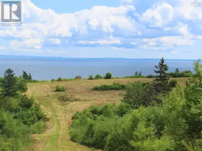 A BEAUTIFUL 11 ACRE PARCEL OF LAND WHICH SLOPES TO THE WATERS OF ST. GEORGE'S BAY, LOCATED IN THE CO...