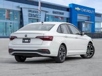 The 2024 Volkswagen Jetta Comfortline stands out in a refined White finish that complements its slee... (image 5)