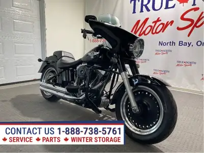 Very cool Canadian Harley Fat Boy Lo at True North Motor Sports has just 31,307 km. Blacked Out Deni...