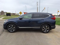NEW TO CANADA? WE HAVE AN APPROVAL WAITING FOR YOU! The 2017 Honda CR-V Touring is a well-rounded SU... (image 3)