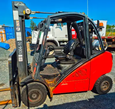 Selling a Linde H30T propane forklift - 19,400 hours - 3,000 kg (6,000 lbs) - 3-mast; ~16 feet of li...