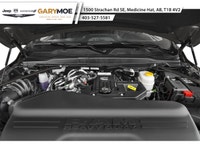 The 2026 Ram 3500 Laramie 4x4 Crew Cab with an 8 Box is a commanding presence, featuring a bold blue... (image 8)