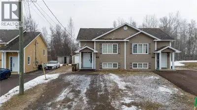 Discover 899 Bernard Street in Dieppe! This well-maintained semi-detached home features a bright, op...