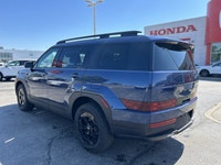 Ready for any adventure or daily commute, this striking Atlantis Blue 2025 Hyundai Santa Fe XRT is e... (image 6)