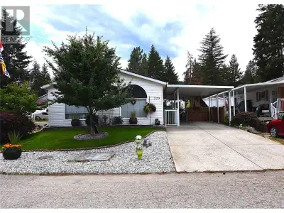 Nestled on a spacious corner lot at 223 Cougar Street in Parker Cove, this immaculate modular home o...