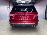 Experience the sophisticated elegance of the 2020 Lincoln Aviator Reserve in a stunning red exterior... (image 6)