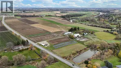 Discover an extraordinary 122.4 acre farm estate nestled along the Grand River, offering a rare blen...