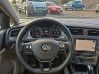 Experience the eco-friendly power of the 2016 Volkswagen e-Golf SEL Premium in attractive white. Thi... (image 7)