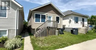 Welcome to this beautifully rebuilt bungalow, situated at 1325 Georgina Ave! This inviting home feat...