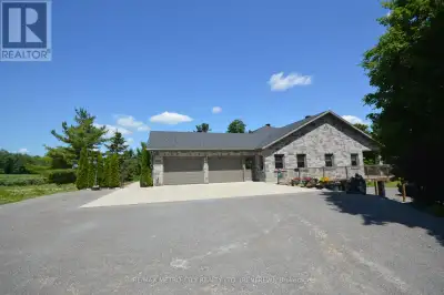 Custom brick bungalow built in 2016 situated on over 31 acres, with a double car attached garage. Op...
