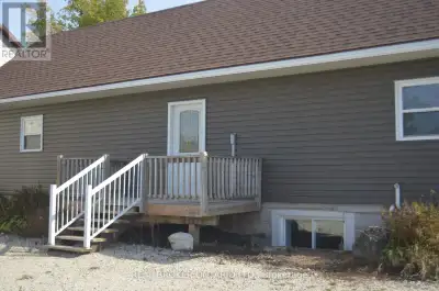 UTILITIES INCLUDED! Discover the charm of rural living in this bright and spacious main floor unit,...