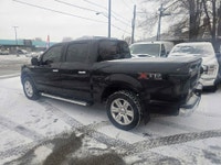 Perfect Auto CLEAN CARFAX - XTR PKG - 5.O L GAS - 4X4 - PANORAMIC SUN ROOF - NAVIGATION - BACK UP CA... (image 1)