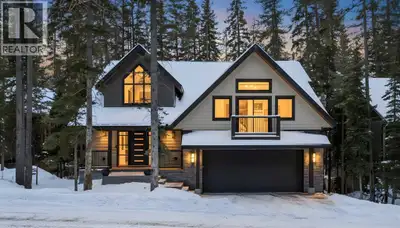 Constructed by Kidner Construction, this exceptional Silvertip near new residence blends refined mou...