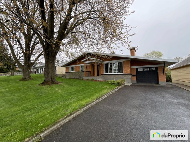 $700,000 - Bungalow for sale in Ste-Foy — photo 1