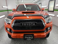 We have a LIFTED 2018 Toyota Tacoma TRD Sport 4x4! This truck looks and drives incredible! It comes... (image 1)