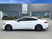 Finished in White with a Black interior, this used 2022 Mercedes-Benz C 43 AMG 4matic Coupe blends e... (image 4)