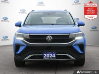 New Price! Odometer is 10494 kilometers below market average! Blue 2024 Volkswagen Taos Comfortline... (image 2)