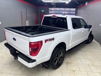 Experience the perfect blend of power and sophistication with the 2022 Ford F-150 XLT, presented in... (image 2)