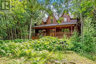 Nestled on a private 1.7-acre treed lot with a picturesque pond and located on a quiet country road,...