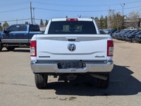 This pre-owned 2022 Ram 2500 Big Horn Crew Cab offers a clean and commanding look with its Bright Wh... (image 4)