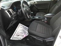 Experience the power of a 2019 Ford Ranger XLT in a crisp white finish, equipped with a robust 4x4 d... (image 9)