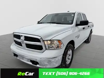 The 2023 Ram 1500 Classic SLT 4x4 Crew Cab offers a legendary combination of heavy-duty capability a...