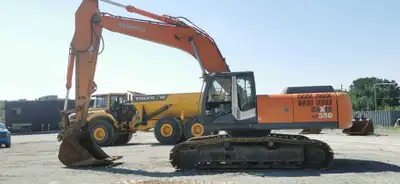 13,700 hours, engine rebuilt at 11,000 hours, auxiliary hydraulics, manual quick connect bucket, esp...