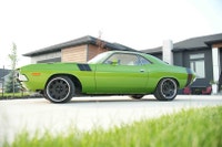 This 1974 Dodge Challenger Pro-Touring build is a standout creation. A gem for fellow car enthusiast... (image 7)