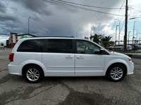 The 2015 Dodge Grand Caravan SXT is a versatile minivan designed to deliver family-friendly comfort,... (image 5)