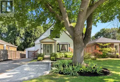 Walk to the lake! This beautifully renovated home sits on an oversized 150-ft deep, private lot with...