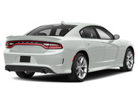 The Dodge Charger GT AWD in a pristine white finish is the embodiment of power and precision with it... (image 1)