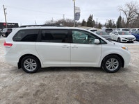 This 2014 Toyota Sienna LE in classic white is a proven, family-friendly minivan known for outstandi... (image 5)