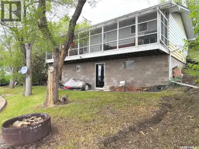 Welcome to 66 Pasqua Lake Road, a year-round waterfront retreat offering 92 feet of beautiful shorel...