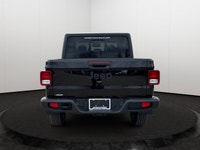 This 2026 JEEP GLADIATOR SPORT 4X4 has the following options Cloth Low-Back Bucket Seats, Uconnect 5... (image 4)