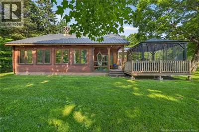 Welcome to paradise! Nestled along the picturesque Middle River, this beautifully updated waterfront...